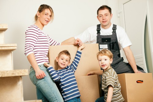 Packed boxes and furniture ready for removal services in Tooting