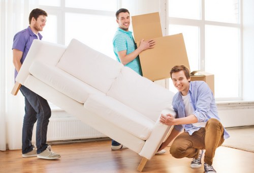 Loading furniture into a van for a South London relocation