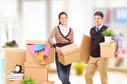 Packed office equipment ready for a business move in Tooting