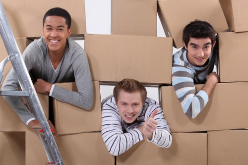 Trained movers handling furniture with care