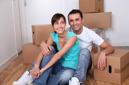Packed moving boxes and furniture ready for collection