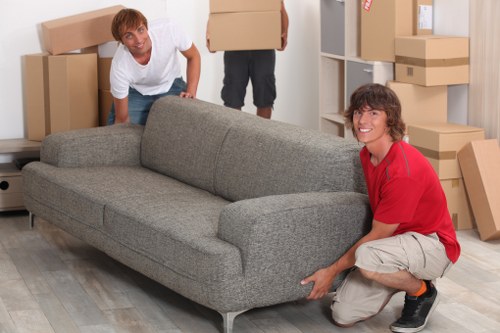 Furniture and boxes being loaded in a van for a Tooting move