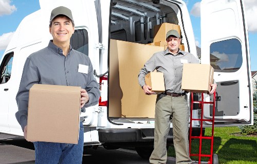 Local van service handling a furniture delivery in Tooting